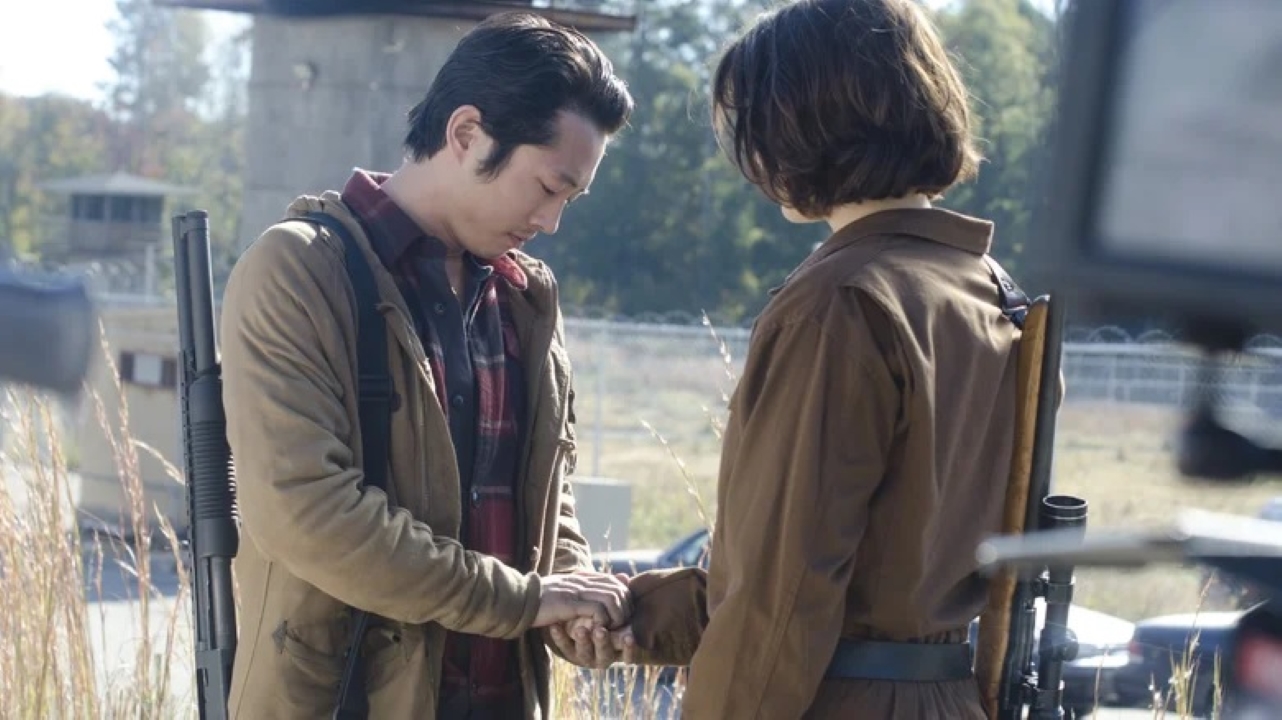 Glenn (Steven Yeun) e Maggie (Lauren Cohan) em The Walking Dead (Reprodução / AMC)